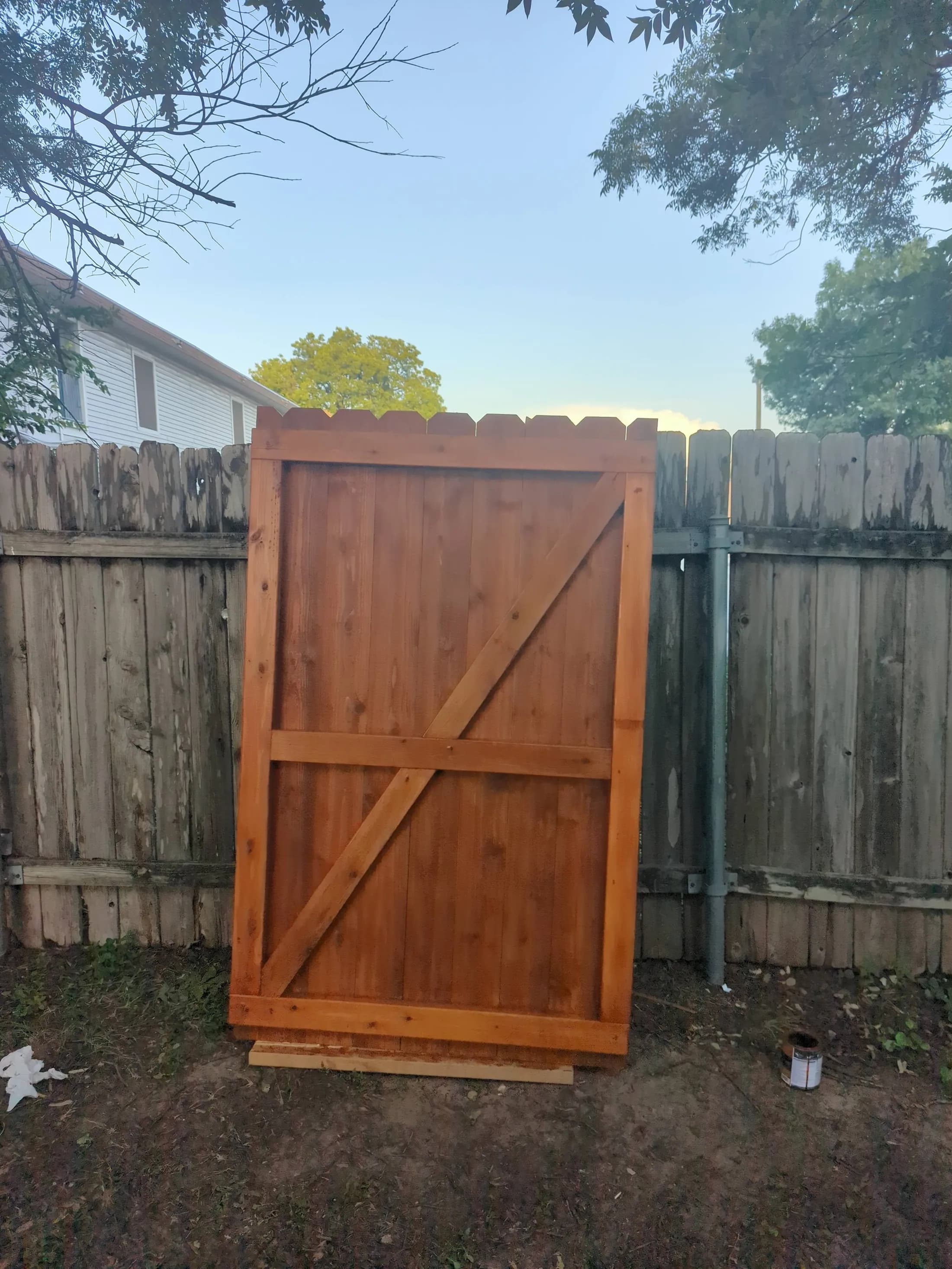Custom cedar fence gate construction by Garner Handyman